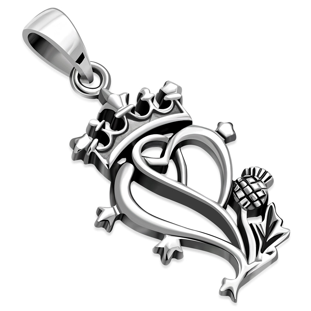 Silver pendant with heart design and thistle flower on a white background