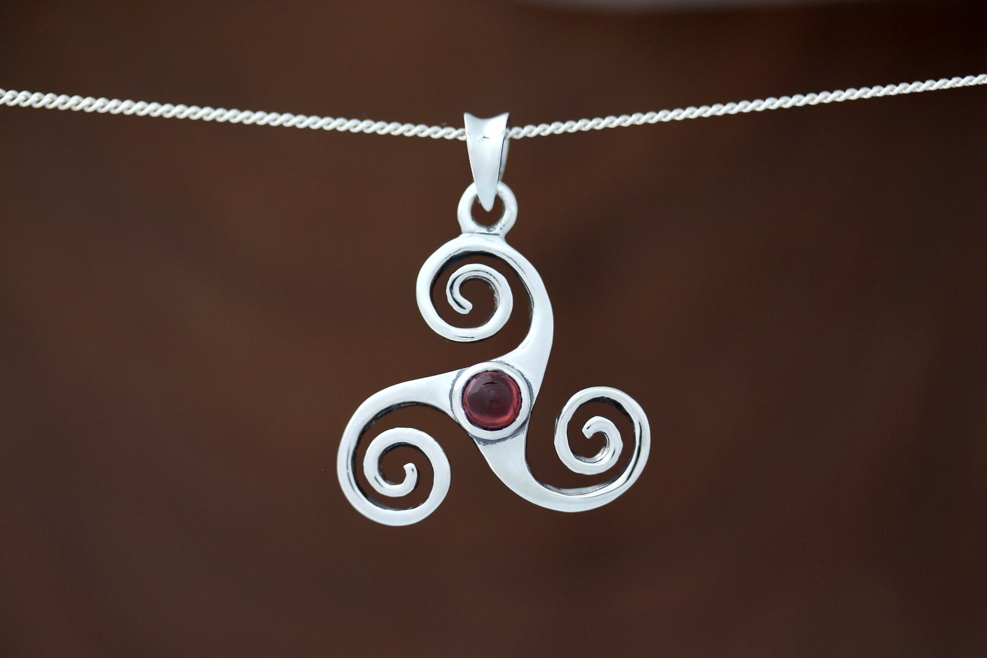 Triskele Stone Pendant Triple Spiral with Red Garnet – Celtic